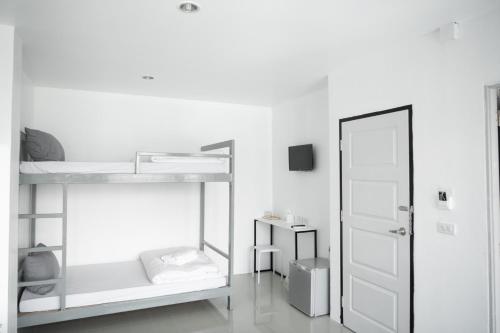 Ein Bett oder Betten in einem Zimmer der Unterkunft Studio 41 Salaya-Sai4