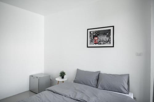 Ein Bett oder Betten in einem Zimmer der Unterkunft Studio 41 Salaya-Sai4