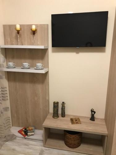Televisyen dan/atau pusat hiburan di ФЛАМА РЕЗИДЕНТС