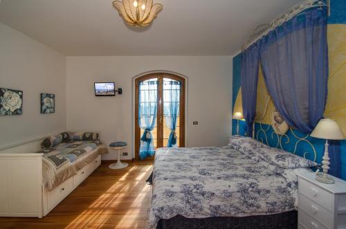 Postel nebo postele na pokoji v ubytování La Casa Gialla