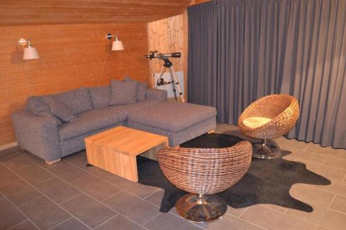 Coin salon dans l'établissement Apartment Cristal
