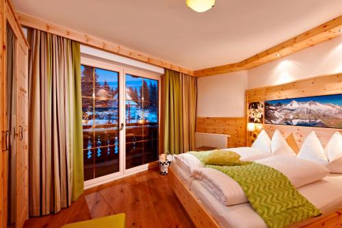Posteľ alebo postele v izbe v ubytovaní Biohotel Castello Königsleiten
