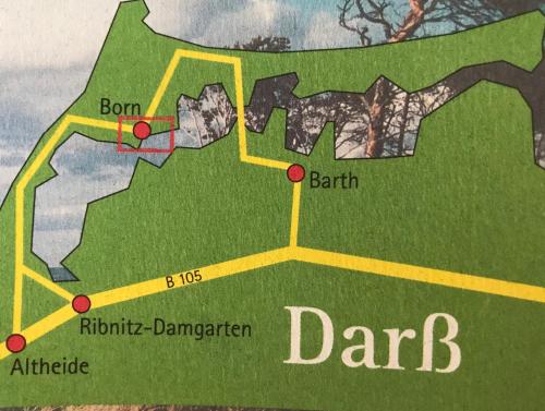 a map of a park with red dots at "Leuchtturmhaus" by Ferienhaus Strandgut in Born