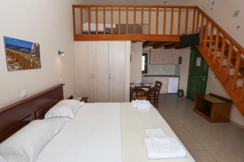 A bed or beds in a room at Irides
