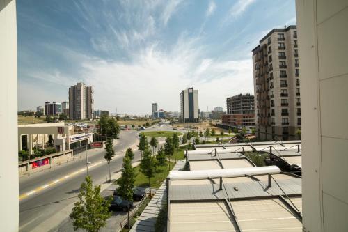 a view of a city street with tall buildings at Medproper Suites Airport in Istanbul
