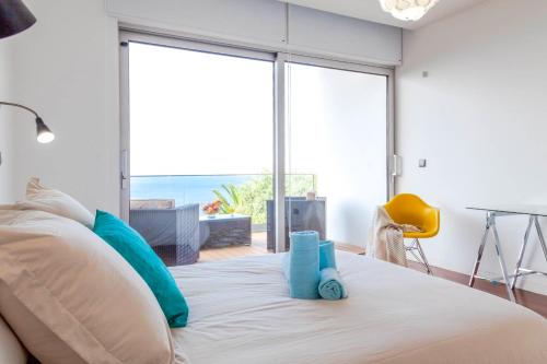 カニコにあるVilla Chimera By LovelyStayのベッドルーム1室(ベッド1台付)が備わります。