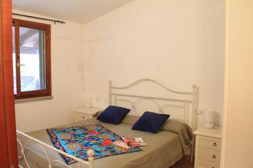 En eller flere senge i et værelse på Abba Urci