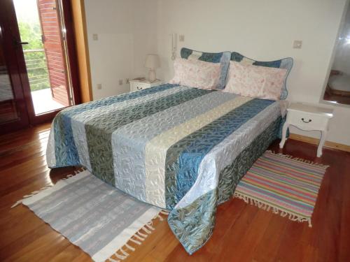 Katil atau katil-katil dalam bilik di VianasHome