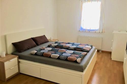 Postel nebo postele na pokoji v ubytování BodenSEE Apartment Allensbach FEWO 2