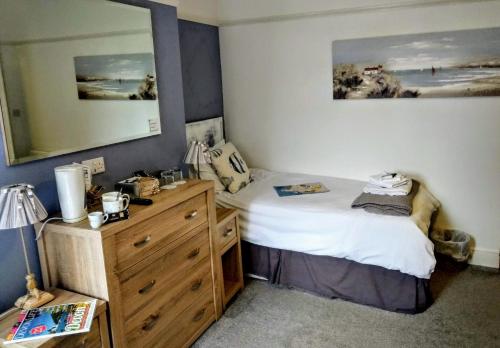 Posteľ alebo postele v izbe v ubytovaní Summerwind Guest House