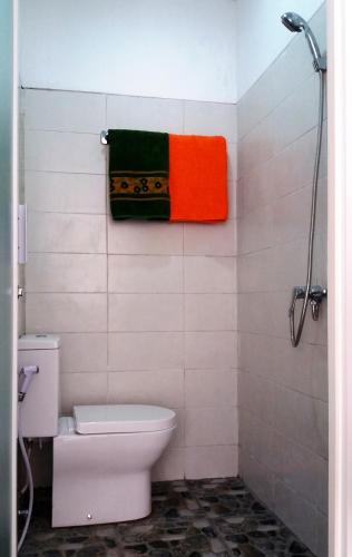 Koupelna v ubytování Donata House