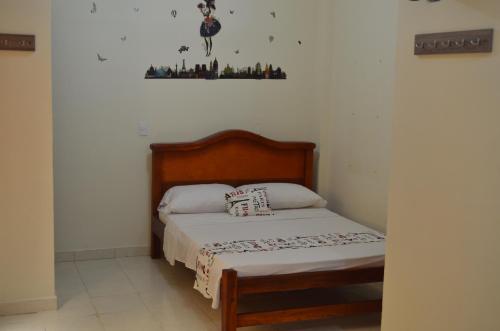 Postel nebo postele na pokoji v ubytování Hotel Plaza Cúcuta Center
