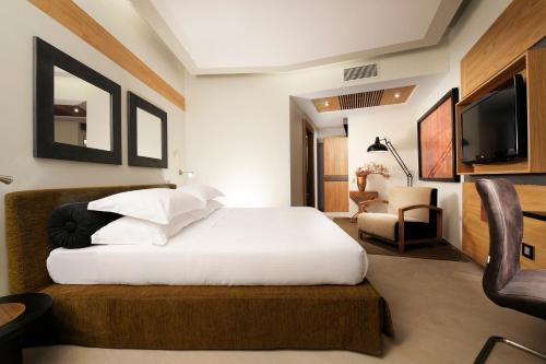 Postel nebo postele na pokoji v ubytování Babuino 181 - Small Luxury Hotels of the World