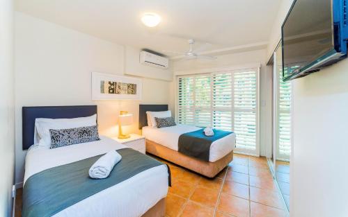 Katil atau katil-katil dalam bilik di The Cove Yamba