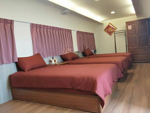 Cama o camas de una habitación en Da Yi Train Homestay