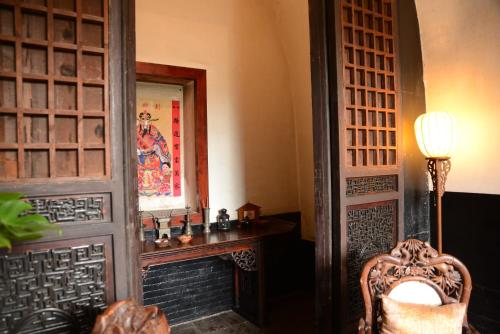 Posezení v ubytování Pingyao Yide Hotel