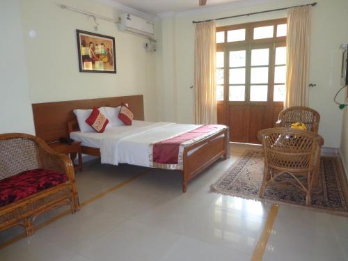 Postel nebo postele na pokoji v ubytování The Tubki Resort