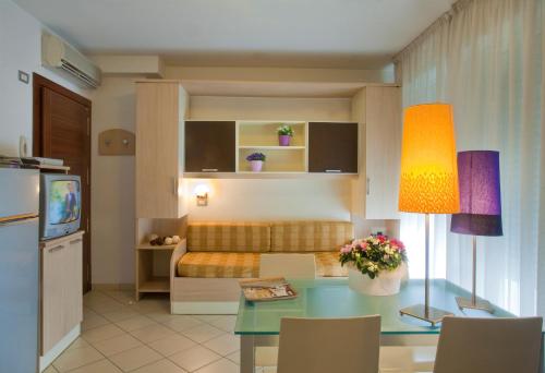 A bed or beds in a room at Residence Il Tulipano