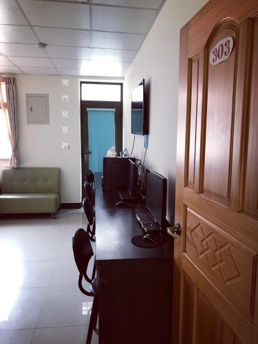 Dongyin First Homestayにあるテレビまたはエンターテインメントセンター