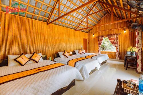 Ένα ή περισσότερα κρεβάτια σε δωμάτιο στο Trang An Valley Bungalow