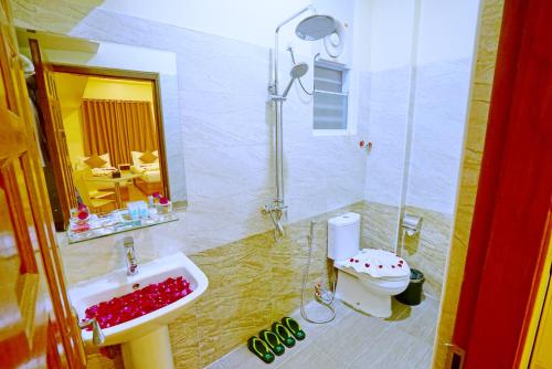 Koupelna v ubytování Hotel Aurora