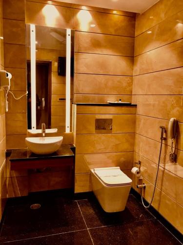 Koupelna v ubytování JRD Pride-Business Hotel