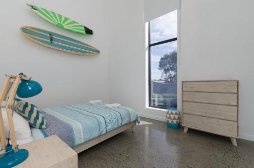 Katil atau katil-katil dalam bilik di Sunset Place Apartments