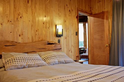Postel nebo postele na pokoji v ubytování Reserva los Bollenes