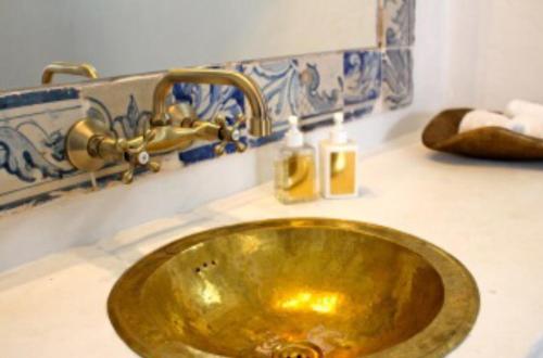 A bathroom at Monte Capitão Country house