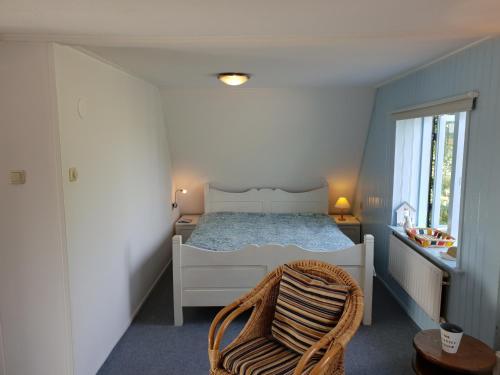 Ένα ή περισσότερα κρεβάτια σε δωμάτιο στο Appartement Soigner!