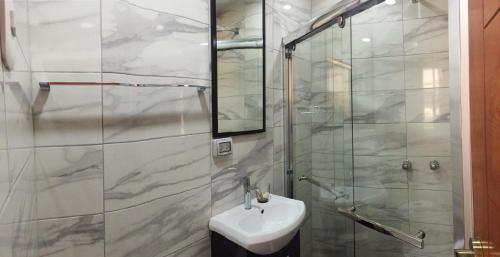 Koupelna v ubytování A-Hope Suite Hotel