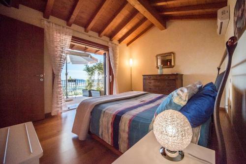 Postel nebo postele na pokoji v ubytování B&B La Rubiana