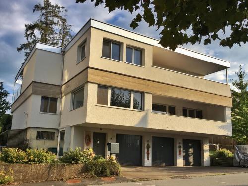 a tall building with at Lakelodge Romanshorn in Romanshorn