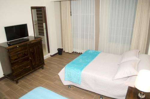 Cama o camas de una habitación en Nativa suites
