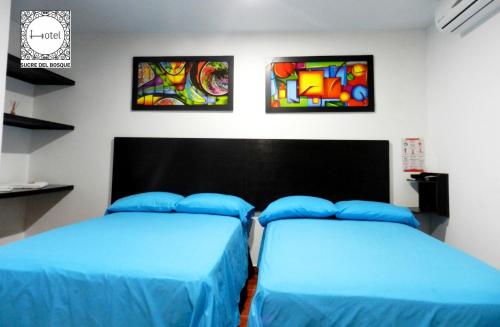 Postel nebo postele na pokoji v ubytování Hotel Sucre Del Bosque