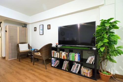 A television and/or entertainment center at Tini Kati Hostel