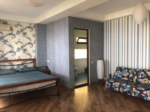 Postel nebo postele na pokoji v ubytování Guest House Guriani