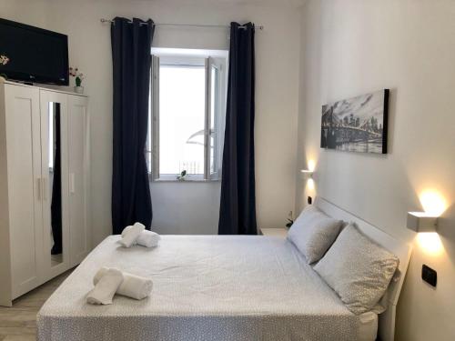 Ένα ή περισσότερα κρεβάτια σε δωμάτιο στο CASALE PRATOTERRA 2