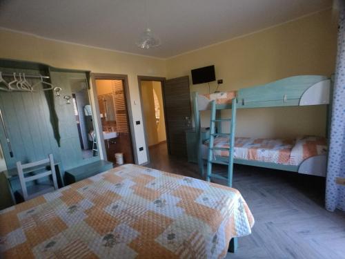 Postel nebo postele na pokoji v ubytování Lacus Pensilis