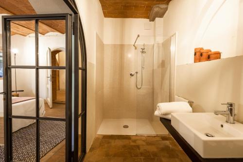 a bathroom with a sink and a shower at Tenuta Santa Trice in Riotorto