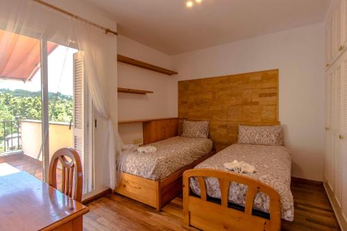 Posteľ alebo postele v izbe v ubytovaní Les Canyes Cottage, Private Villa Resort