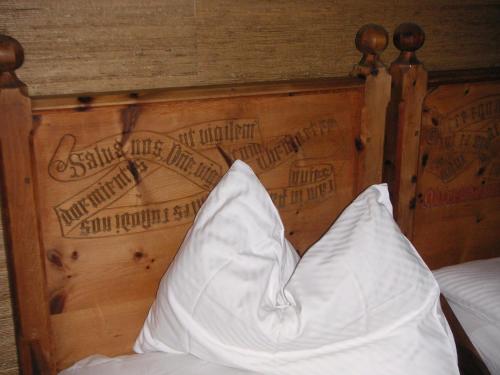 Postel nebo postele na pokoji v ubytování Hotel Ansitz Kematen ***S