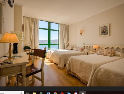 Katil atau katil-katil dalam bilik di Hotel Stellamaris