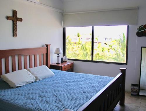 En eller flere senge i et værelse på Villa 24C Los Cabos Monterrico