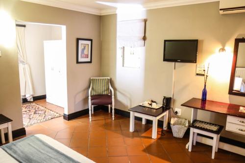 Televisyen dan/atau pusat hiburan di Newcastle Country Lodge