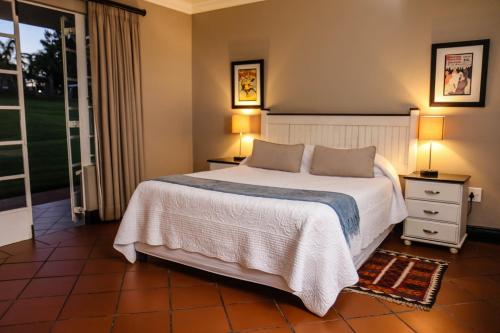 Katil atau katil-katil dalam bilik di Newcastle Country Lodge
