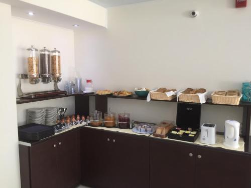 Kuchyň nebo kuchyňský kout v ubytování Anatoli