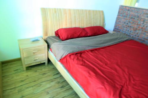 Dalan Youth Hostelにあるベッド