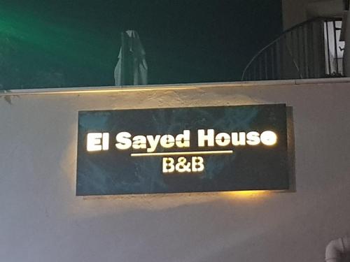 a sign that says el savaged house bbb at El Sayed House in ‘Akko