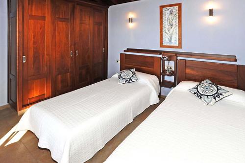 A bed or beds in a room at Casa Ceferino